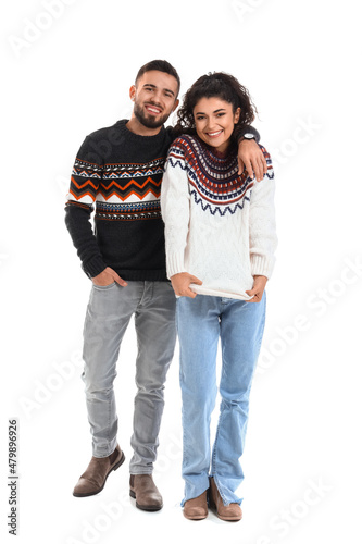 Happy young couple in warm ...