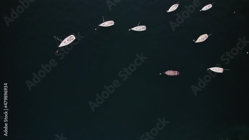 4K drone view of boats in the lake of Garda