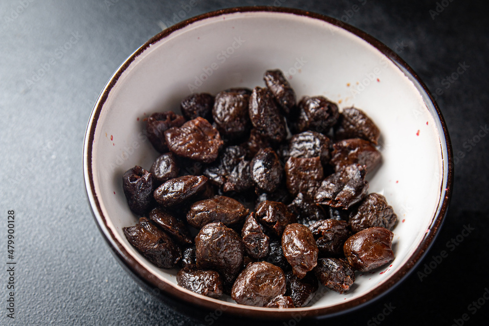 olive pitted dried smoked olives healthy meal food snack on the table copy space food background olive pitted dried smoked olives healthy meal food snack on the table copy space food background