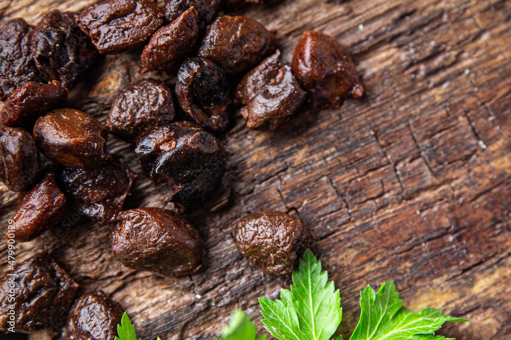 olive pitted dried smoked olives healthy meal food snack on the table copy space food background