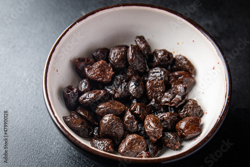 olive pitted dried smoked olives healthy meal food snack on the table copy space food background