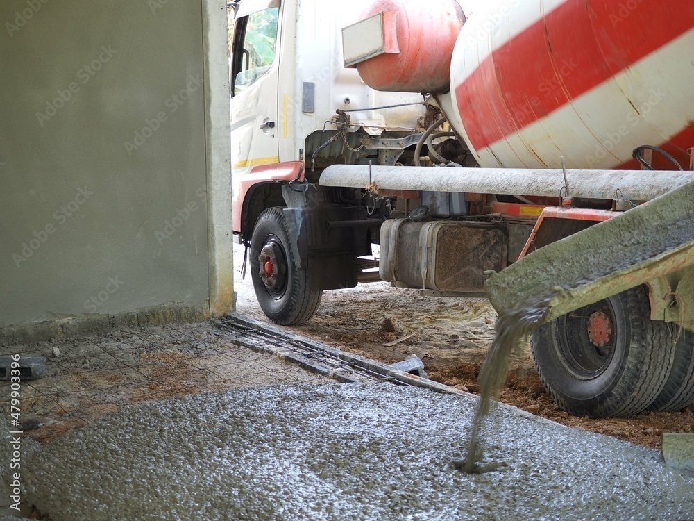 Concrete pouring during commercial concreting floors of building or house. closeup photo, blurred. Concrete pouring during commercial concreting floors of building or house. closeup photo, blurred.