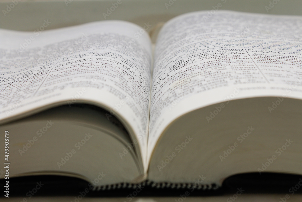 the book is an old thick stack of the bible the book is an old thick stack of the bible