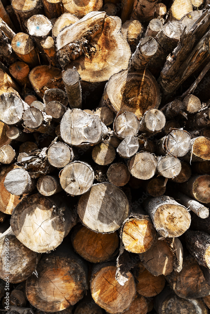 Natural wooden background, closeup of chopped firewood Natural wooden background, closeup of chopped firewood
