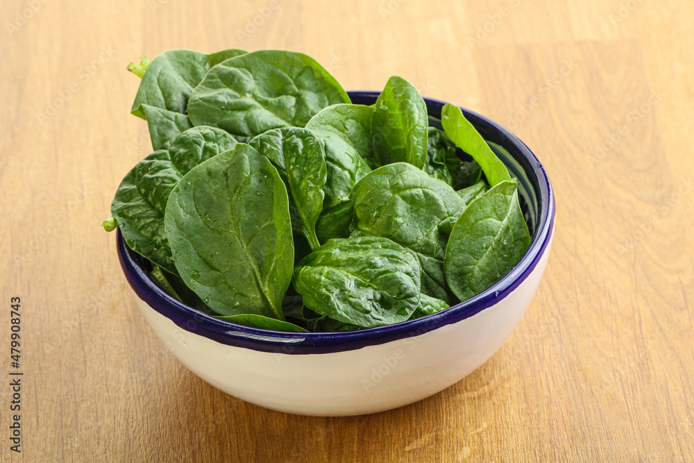 Fresh green spinach leaves in the bowl Fresh green spinach leaves in the bowl