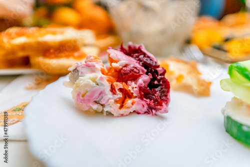 Traditional Russian salad with beetroot and salted herring for the New Year