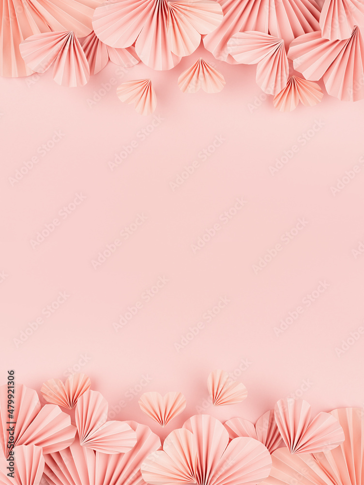Hearts background for Valentines day, wedding - beautiful tender pink paper  ribbed hearts in simple origami style soar on pastel pink color as footer,  header border, copy space, vertical. Stock Photo
