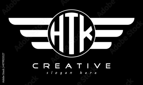 HTK three letter monogram type circle letter logo with wings vector template. photo