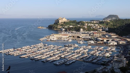 beautiful view of the port of Baia in the Campi Flegrei with Vesuvius, Capri island and Sorrento peninsula in the background. Phlegraean Fields, Naples, Campania, Italy photo