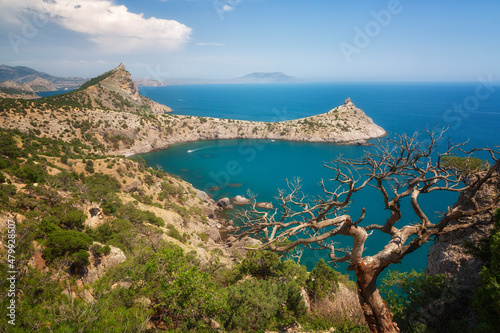 Beautiful view to mountains Karaul Oba on the cape Kapchik, mountains Falcon and Eagle and the Black Sea in the sunny summer day photo