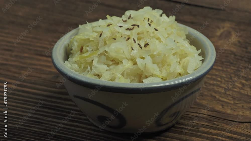 Fresh homemade sauerkraut in a bowl Fresh homemade sauerkraut in a bowl