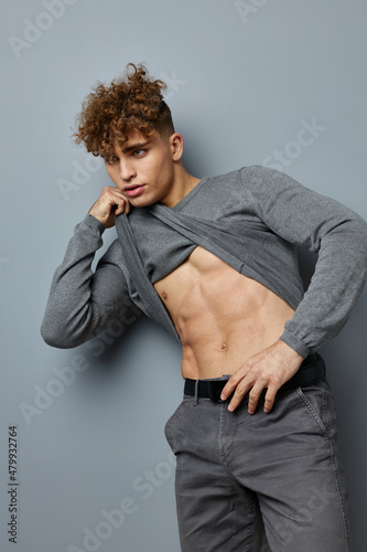 Attractive man sexy posing self confidence isolated background