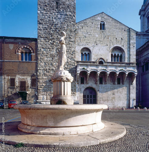 Brescia. Lombardia. Fontana della Minerva davanti al Broletto, la Torre del Pegol e la loggia delle Grida photo
