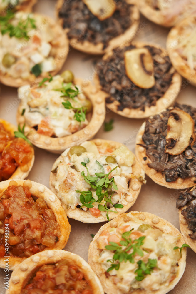 various snacks in tartlets close-up