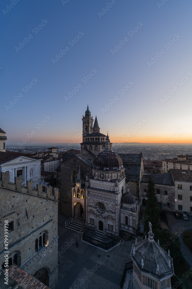 Basilica of Santa Maria Maggiore in Bergamo after the sunset seen from the Campanone bell tower.