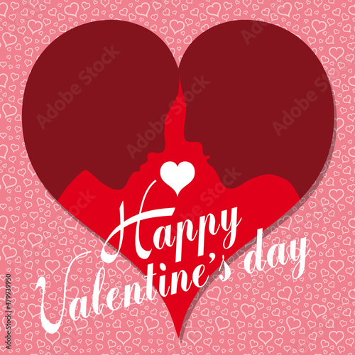 Carte pour le jour de la saint Valentin avec 2 silhouettes de têtes, une femme et un homme, incrusté dans un cœur rouge - fond rose avec de multiple petits cœurs.