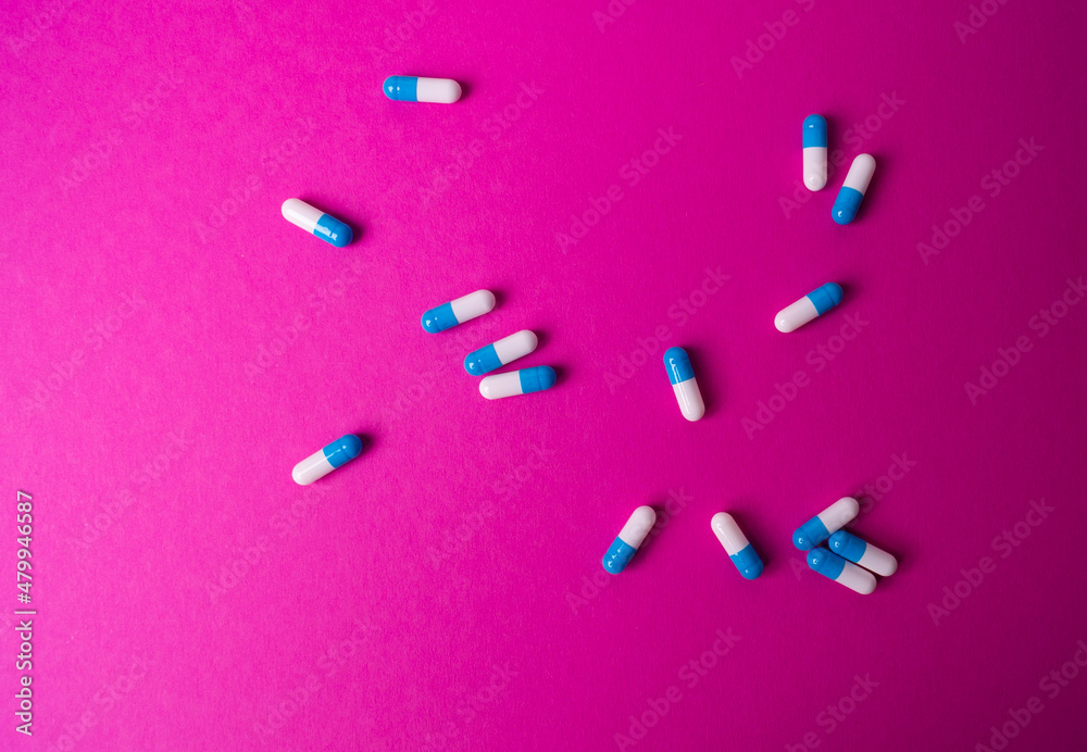 white and blue pills general background white and blue pills general background