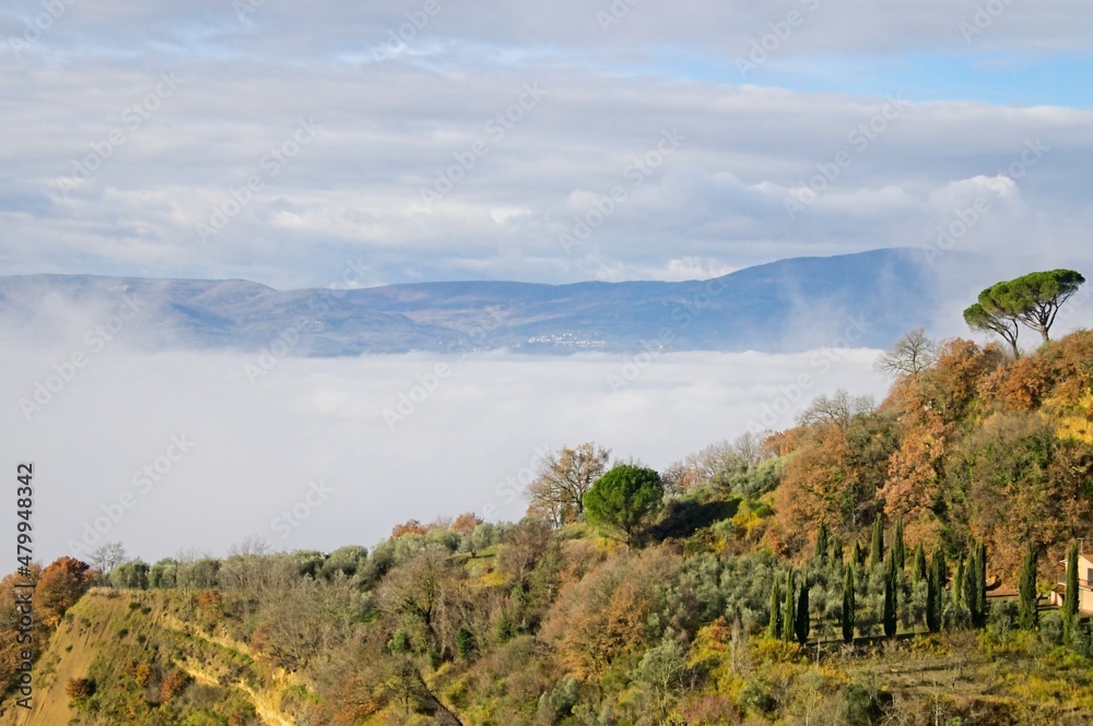 Beautiful View of the Hills of Umbria Italy in Winter with Fog