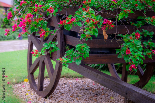 decorative wooden cart with flowers