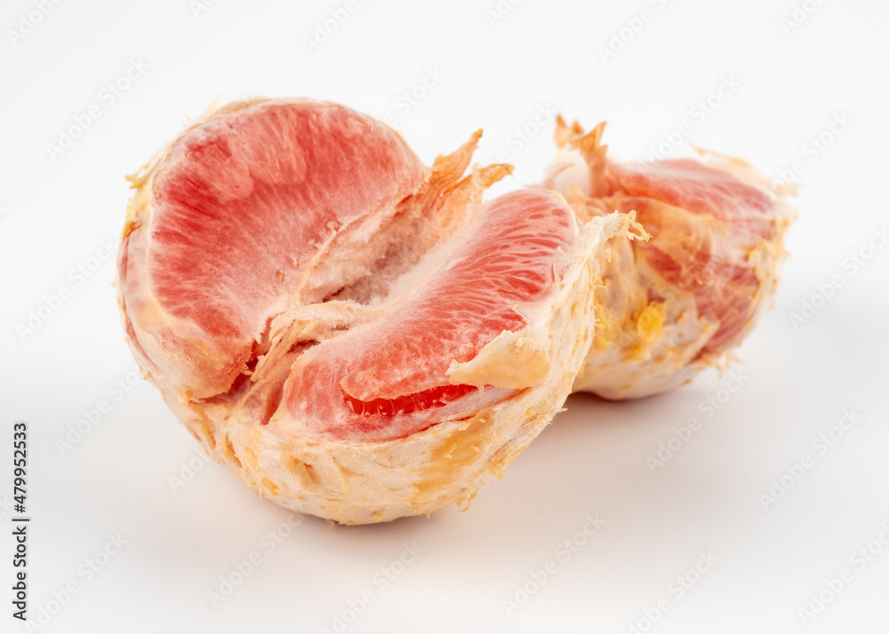 Red grapefruit on a white background. Red grapefruit on a white background.