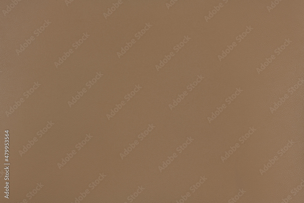 Nude camel color textured smooth leather surface background, small grain Nude camel color textured smooth leather surface background, small grain