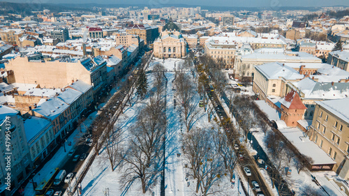 aerial view of city square in front of opera building in Lviv, sunny winter day