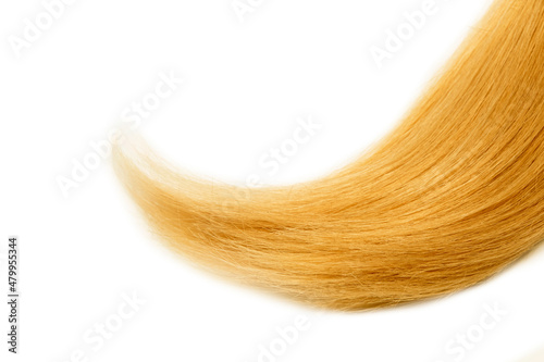 yellow blond Natural hair on heart shape , isolated on white background