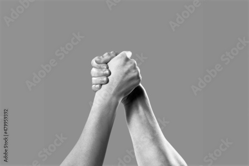 Friendly handshake, friends greeting, teamwork, friendship. Challenge strength comparison