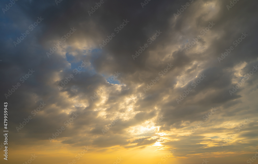 Sunset sky. Abstract nature background. Dramatic blue with orange colorful clouds in twilight time. Sunset sky. Abstract nature background. Dramatic blue with orange colorful clouds in twilight time.