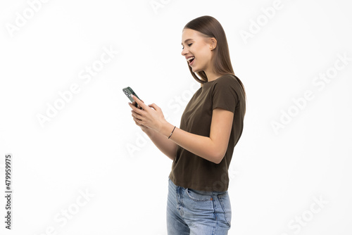 Beautiful woman use of cellphone on white background