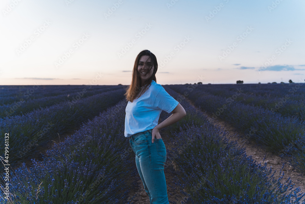 young brunette woman smile in lavender field