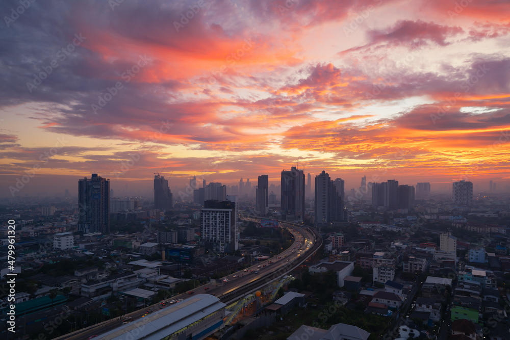 Fototapeta premium Aerial view of highway street road at Bangkok Downtown Skyline, Thailand. Financial district and business centers in smart urban city in Asia.Skyscraper and high-rise buildings at sunset