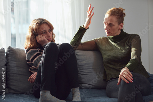 Tablou pe pânză Teenage girl in difficult mood with angry mom.