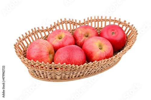 Red apple in wattled basket