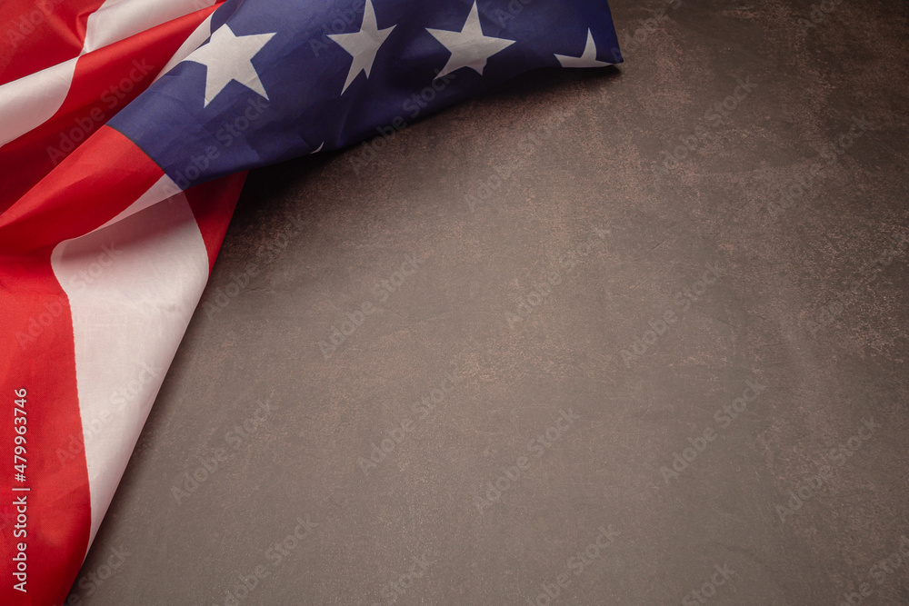 Fototapeta premium American flag on a vintage background with copy space