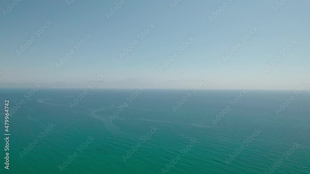 Flight over the sea. The endless horizon below us, only the blue depths. Flight over the sea. The endless horizon below us, only the blue depths.