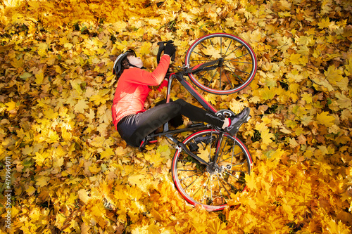 a man on a bicycle in the foliage