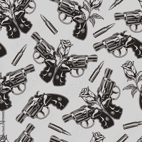 Revolvers and roses seamless pattern