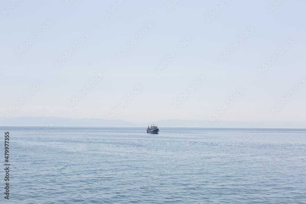 A pleasure ship on Lake Baikal, far from the shore.