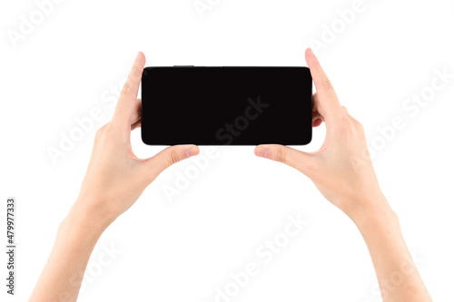 Woman hand holding black smartphone with blank screen isolated on white background.