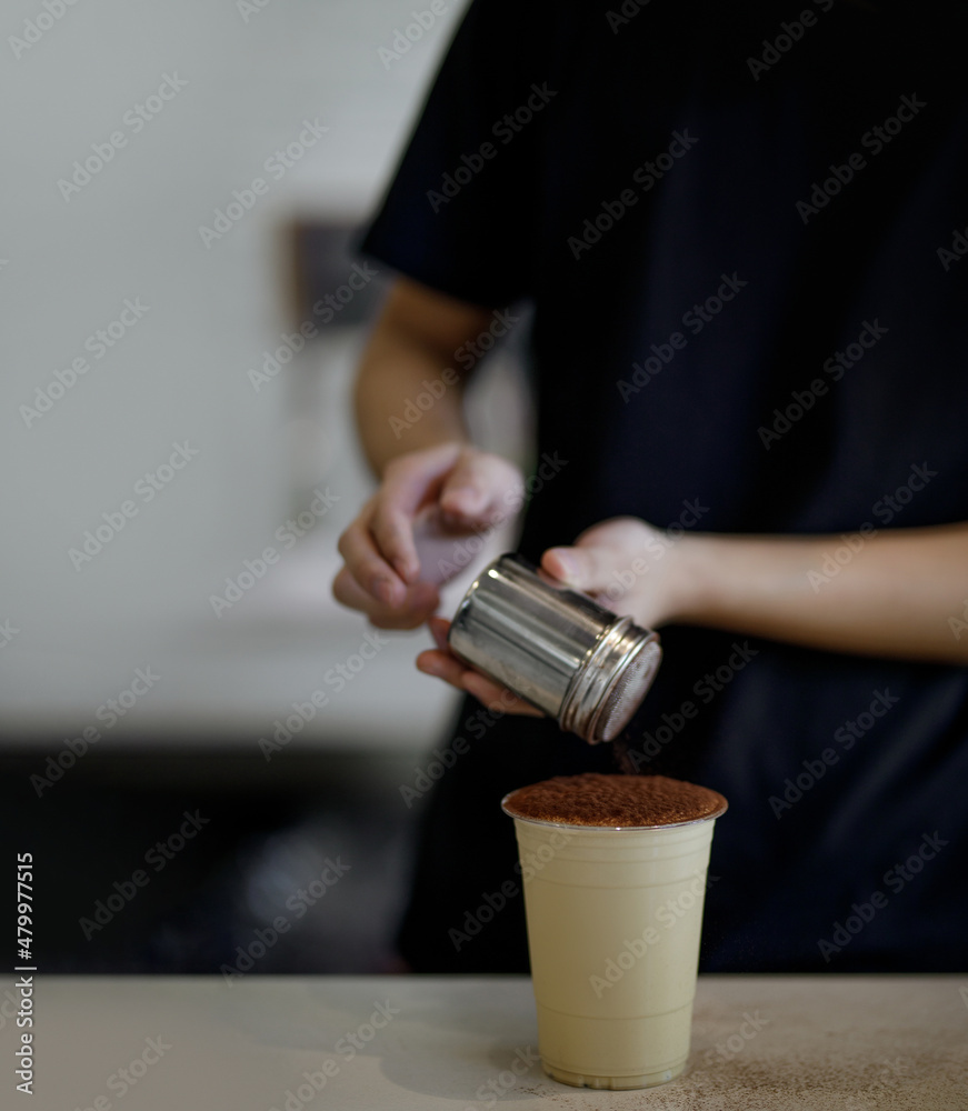 Coffee frappe top with cocoa power making