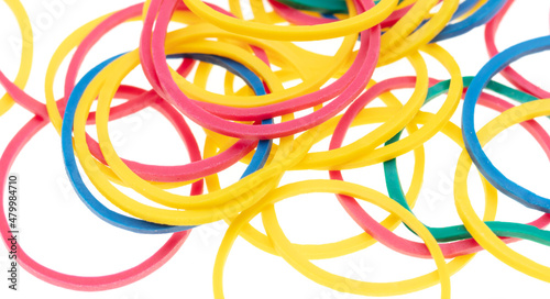 Multi-colored rubber bands isolated on white background.
