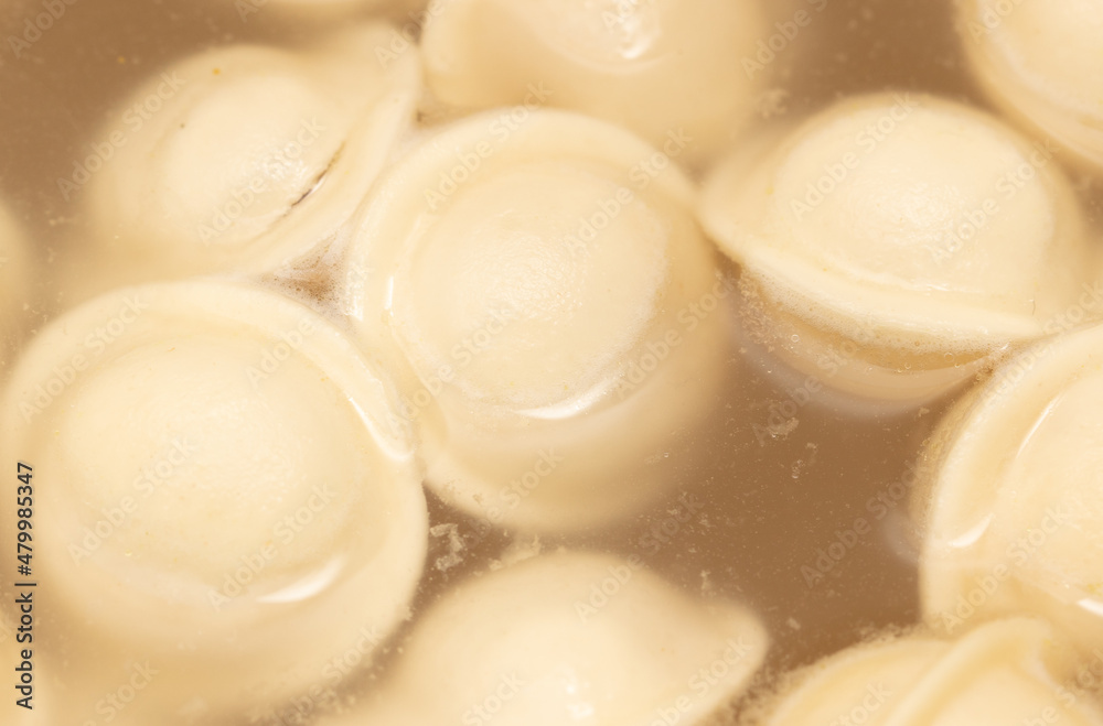 Dumplings made from dough and meat are boiled in boiled water. Dumplings made from dough and meat are boiled in boiled water.