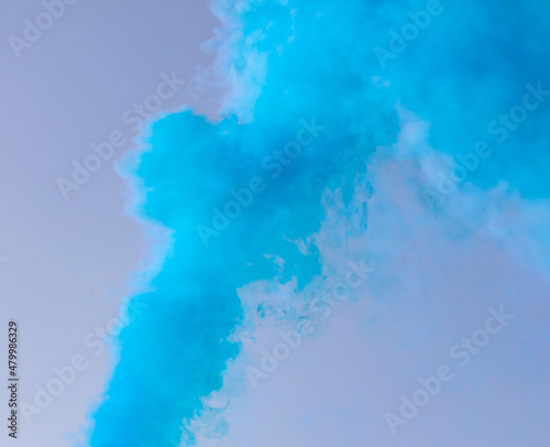 Blue smoke on a blue background.