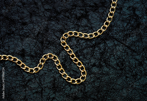 Wallpaper Mural Gold jewelry. Gold necklace on black background Torontodigital.ca