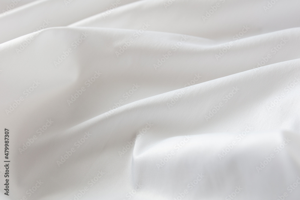 Fototapeta premium White fabric as an abstract background.