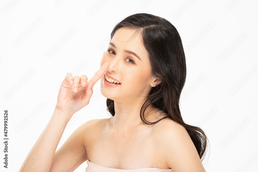 Beautiful Asian woman touching nose smile with clean and fresh skin Happiness and cheerful with positive emotional on white,Plastic Surgery nose,Beauty Cosmetics and spa facial treatment Concept Beautiful Asian woman touching nose smile with clean and fresh skin Happiness and cheerful with positive emotional on white,Plastic Surgery nose,Beauty Cosmetics and spa facial treatment Concept