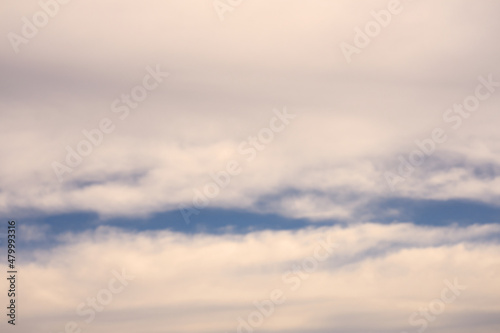 Fototapeta Naklejka Na Ścianę i Meble -  A blue sky among the clouds as a blurred background.