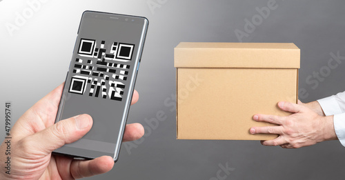 Cardboard box in hands of m...
