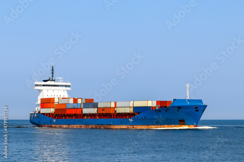 Container ship loaded with containers, sea